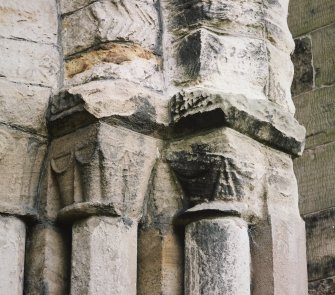 West doorway, detail of capitals on S side of doorway