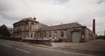 General view of W side of works (Pilmuir Street frontage) from SW
