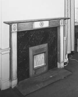 Ground floor, South West apartment, fireplace