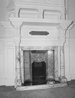 First floor, South West room, fireplace and chimney-piece, detail