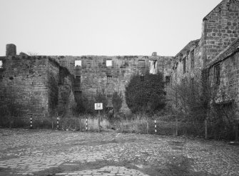 View of ruined block from east
