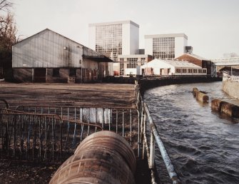 View of distillery from SE, from SW abutment of bridge