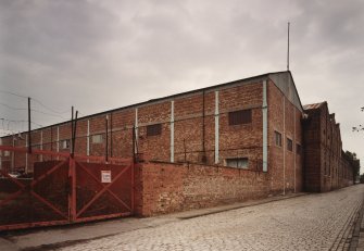 General view of South West corner of works, showing brick-clad erecting shop, with cast-iron uprights