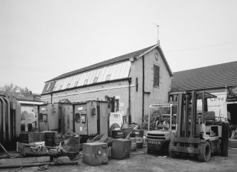 View from South West of annexe to office building, showing oriel window with surrounding rope moulding in South gable