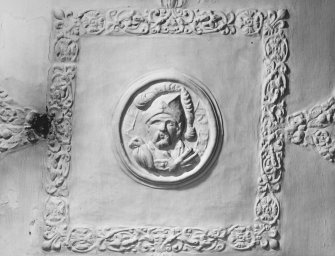Detail of plaster ceiling centre piece in the East room, 1st floor