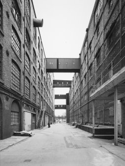 View from North North West between two main blocks of linoleum stoves, showing walkways between  blocks