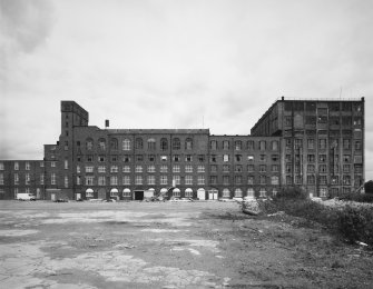 General exterior view from WSW of W side of surviving block of N factory
Photosurvey 11 May 1995