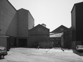 View from the North in yard within the mill complex, showing the rear of the flourmill complex