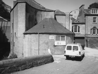 Detailed view from the South West of the circular horsemill, now the boilerhouse and wheat silos