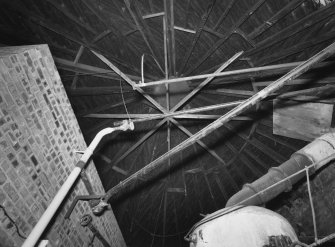 Interior detail of the horsemill, now the boilerhouse circular roof structure - wooden roof trusses supporting slate roof