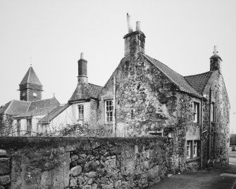 View from South West of No.s 20 and 21 Greenside. Includes tower of Christ's Kirk-on-the-Green.