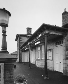 Detail.  Road level ticket office from N.