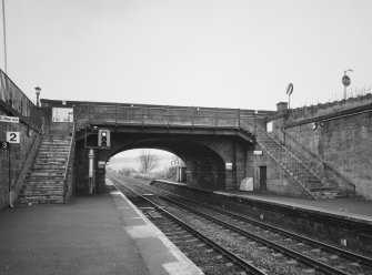 Detail.  Road overbridge and exit/entrance access stairs from S.