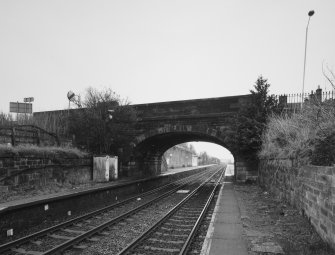 Detail.  Road overbridge and exit/entrance access stairs from N.