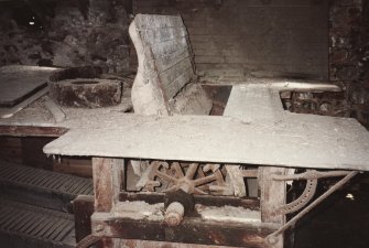 Detail of threshing machine, showing threshing drum (side cover removed) photographed 9 May 1994