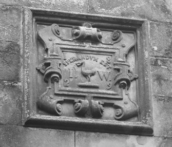 Detail of carved panel, dated 1829, above entrance to porch.