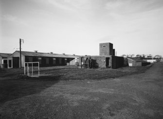 Pill box with barrck block behind, view from south east