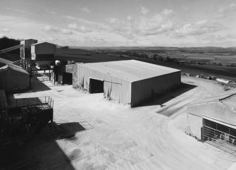 Elevated view from SE of lime store (a former aircraft hangar, moved to the site after World War Two)