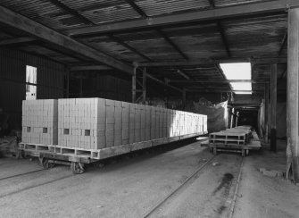 Interior view from NNW of bogie carrying cement bricks after it has emerged from drying tunnel (one of three)