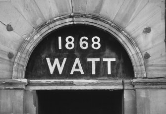 Detail of date plaque above main (N.) entrance