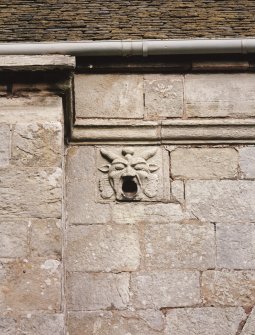 Detail of decorated water spout on S face