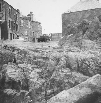 View of rock cut access road to pier.