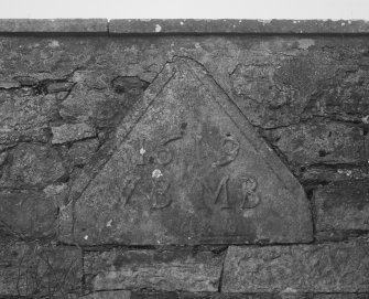 Detail of reser dormer head dated 1619 with initials WB MB