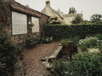 Pond (with Portuguese tilework on adjacent wall), view from NW