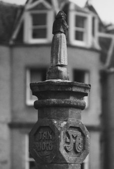 Walled garden, rose garden, sundial capped by small figure, detail