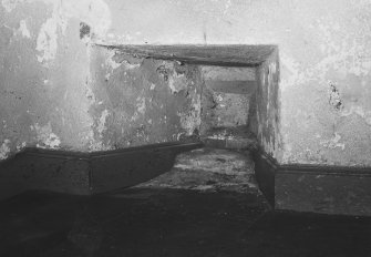 North front, east wing, interior view of archaic pistol embrasure in re-entrant wall between level of ground-floor and first-floor