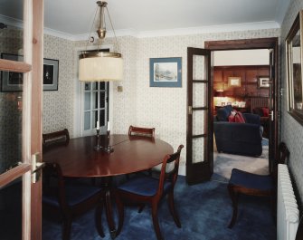 Interior. View of ground floor dining area from E