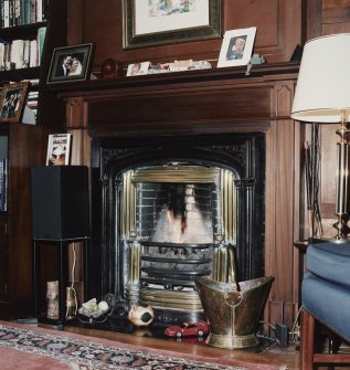 Interior. Detail of 1st floor gallery fireplace