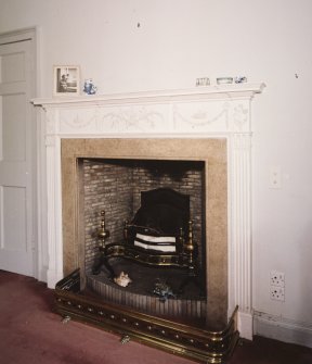 Interior. Second floor.Detail of bedroom fireplace.