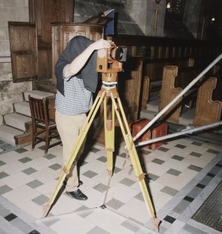 Interior. Nick Beckett (English Heritage) using photogrammetric camera to record Kennedy monument