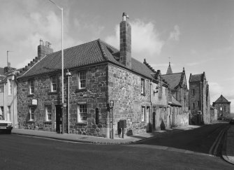 All Saints Episcopal Church.  View of corner block, North Street/North Castle Street and castle from South East.