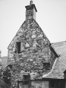 Detail of West front, caphouse of stair tower.