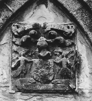 View of South armorial panel on mausoleum wall.