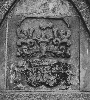 View of East armorial panel on mausoleum wall.