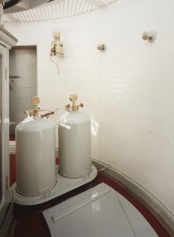 Interior, upper level.
View of paraffin lights and tanks.