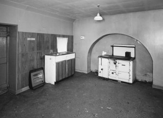 Interior. View of kitchen from West showing arched recess for aga