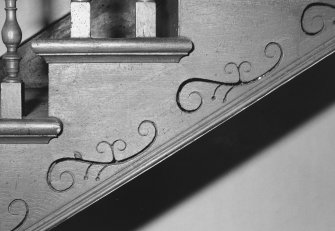 Interior. Detail of incised decoration on the staircase stringer