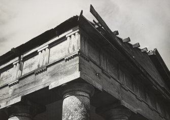 Detailed view of Temple of Theseus showing wooden entablature