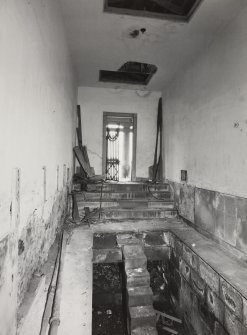 Interior view of Temple of Theseus looking East and showing steps leading into cold bath