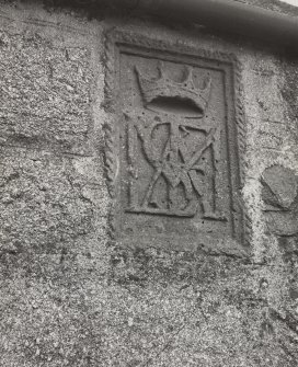 Detail of monogram built into Mains of Pitullie farmhouse.