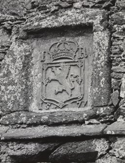 Detail of armorial panel dated 1577 on South wall of square tower, North-East re-entrant angle of courtyard.