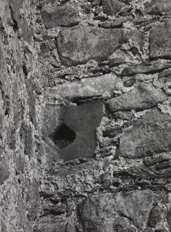 Detail of diamond-shaped pistol or peep-hole in South-West angle of Courtyard wall.