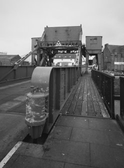 View from WNW of pedestrian walkway, with bridge lowered (closed to harbour shipping)