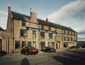 General view from W-S-W of South-West side of warehouse.