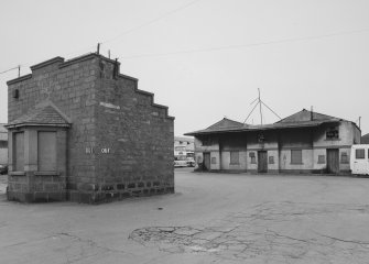 Peterhead, St Peter Street- Windmill Street, Bus depot
View from east showing gatehouse at entrance to depot, and disused offices in centre of yard (distant right)
