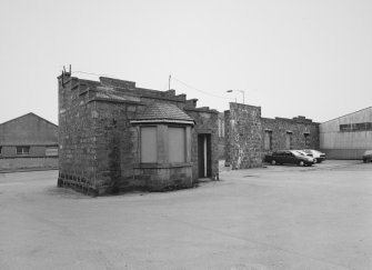 Peterhead, St Peter Street- Windmill Street, Bus depot
View from north of gatehouse at entrance to bus depot